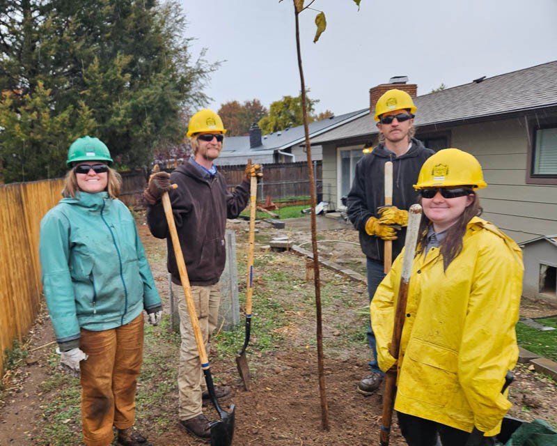 Blue Crew planting a tree for TVCN